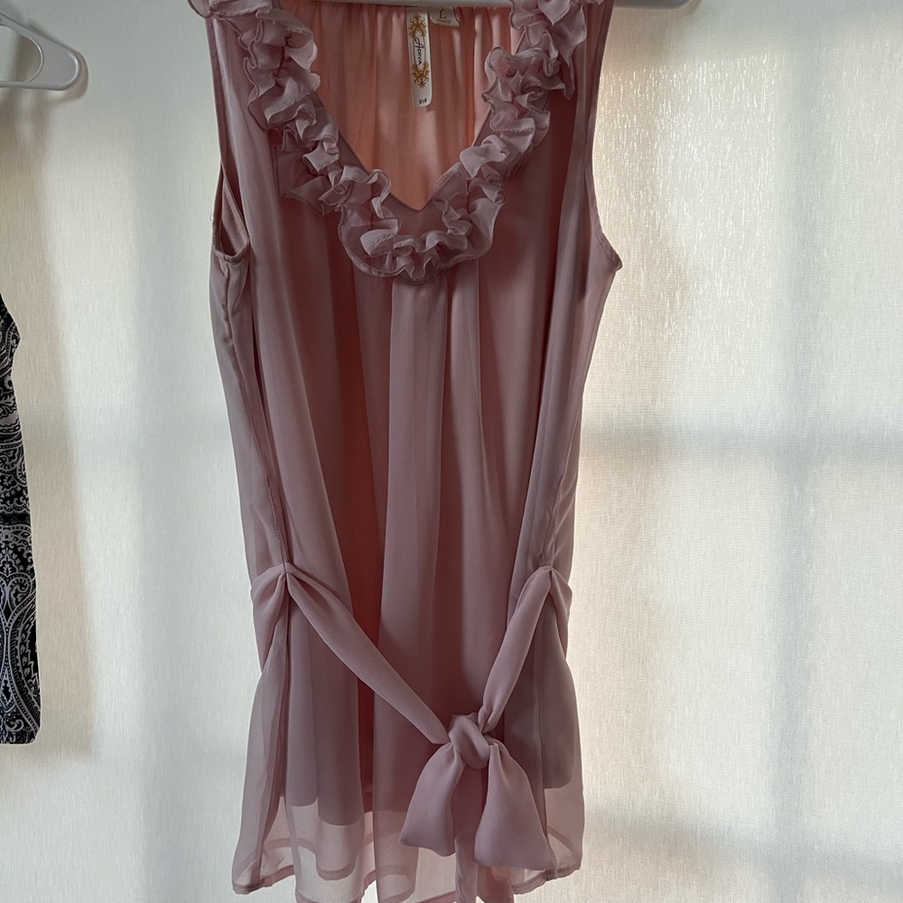 Elegant Pink Sleeveless Top with Ruffle Detail